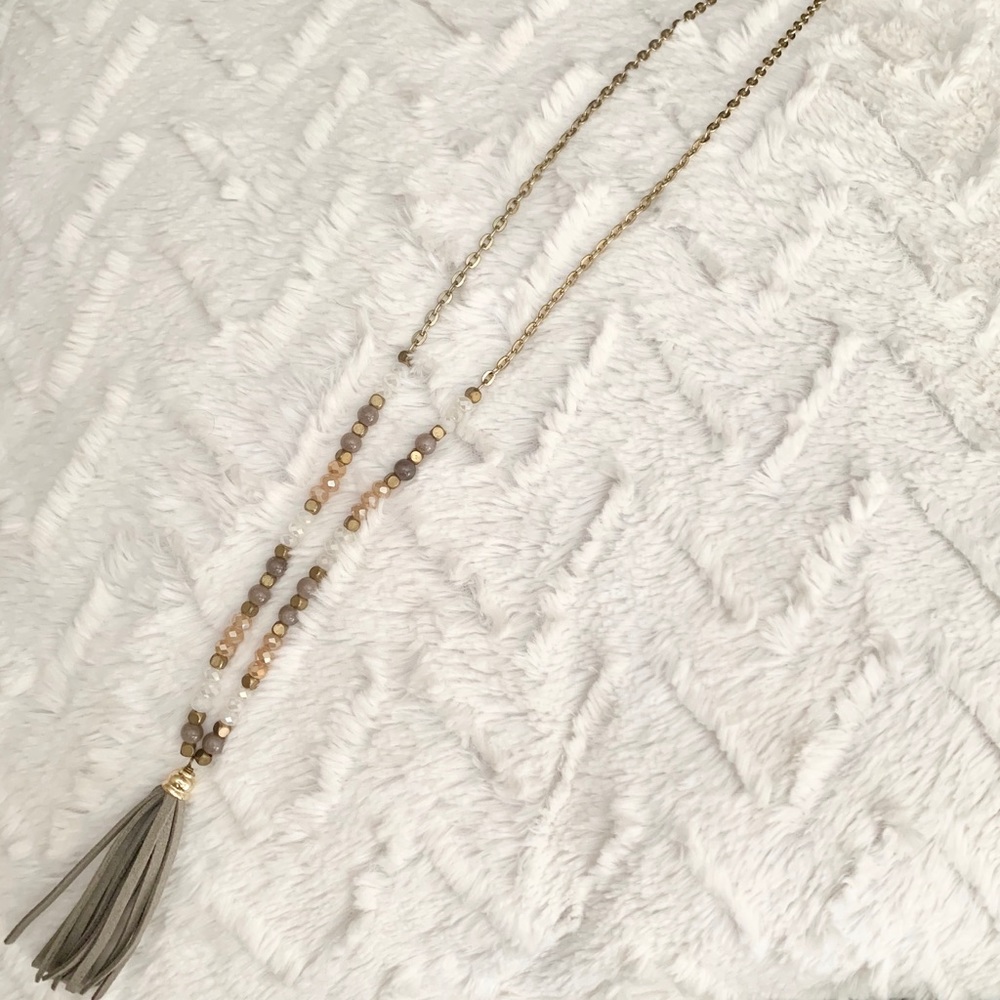 Beaded necklace with gray tassle